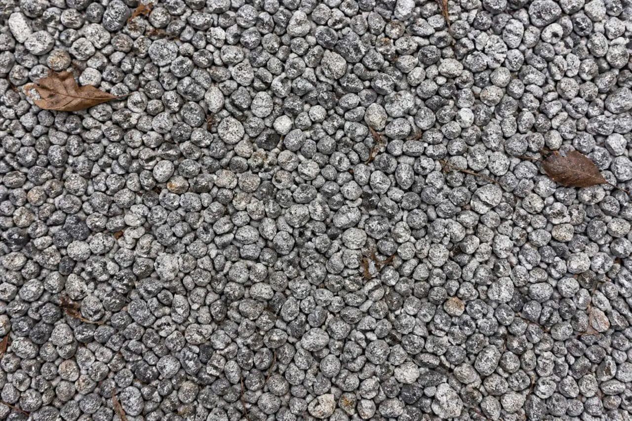 Gravel mulch offers a clean, durable surface for planting beds and garden edges, providing long-lasting texture where low maintenance and drainage are priorities.