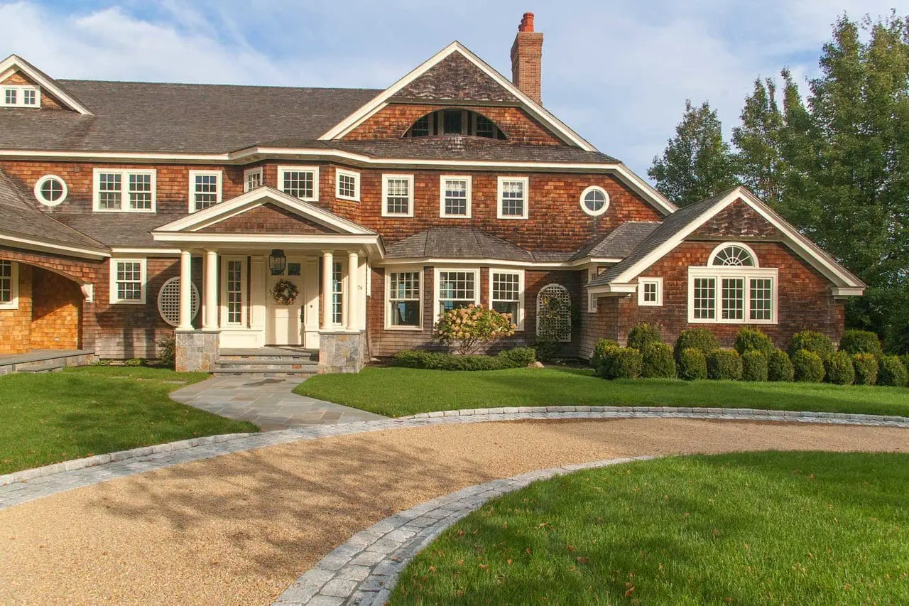 Duxbury, MA - A welcome entrance provided by the circular peastone and granite drive and bluestone walk.