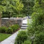 Wellesley, MA - Lushly planted beds of boxwood, holly, magnolia, and birch.
