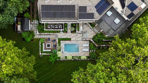 From above, the full landscape plan reveals a carefully organized composition of pool terrace, fire feature, screened porch, and connecting garden spaces.