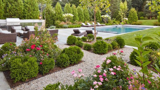 Weston MA, pea stone paths with pool backyard