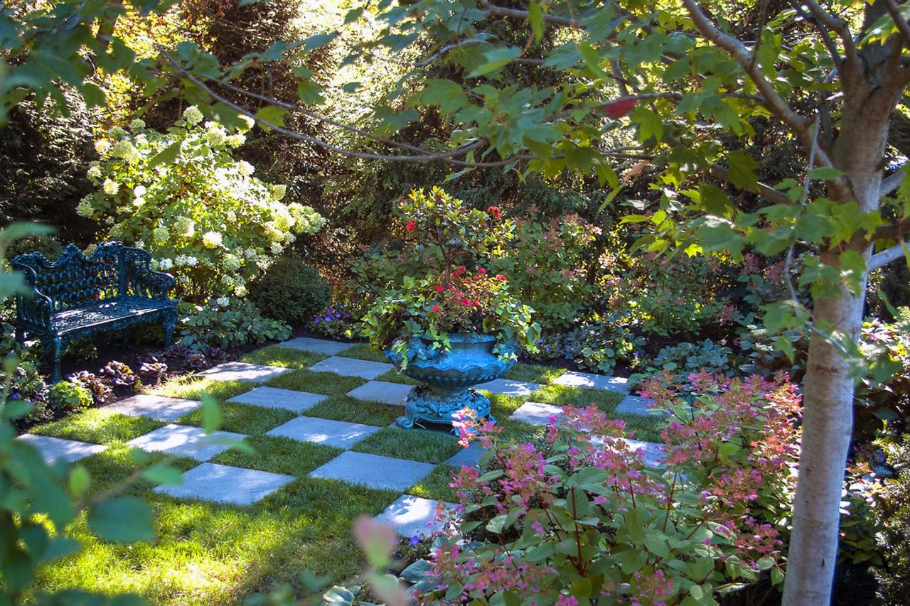 checkerboard garden lawn with seating area