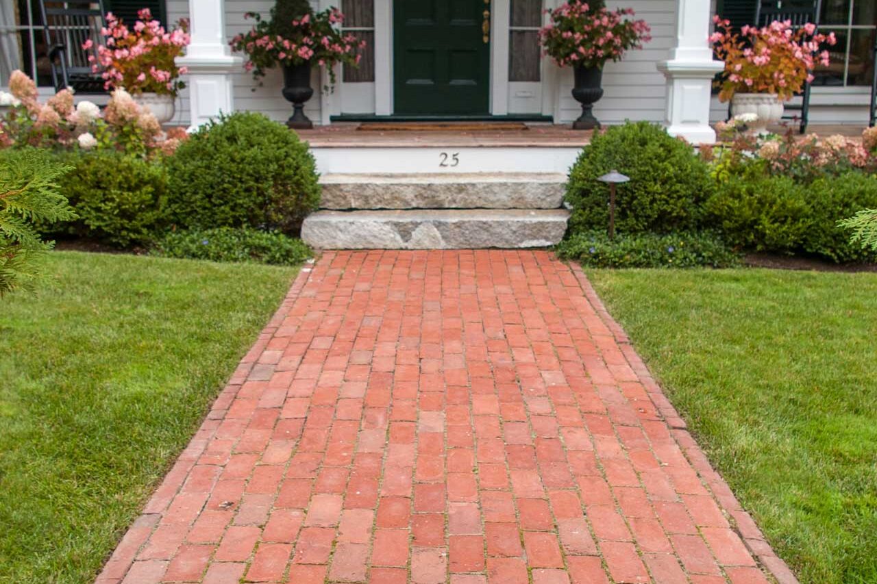 Belmont home front entryway brick walkway
