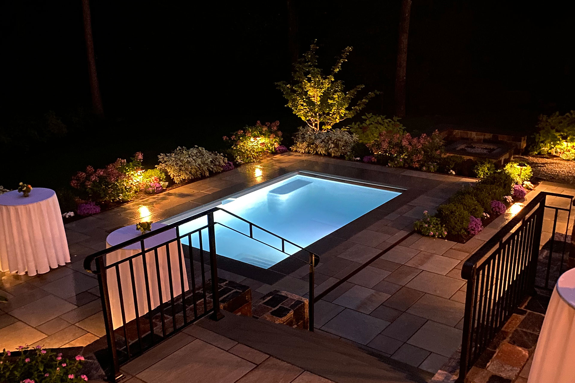 Perimeter lighting frames the pool deck, improving safety and extending evening use of the space.