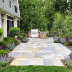 transformations - after - stone patio and gardens