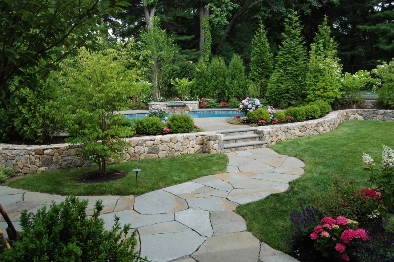 Wellesley, MA - Follow this beautiful Pennsylvania bluestone walkway to a relaxing and private pool retreat.