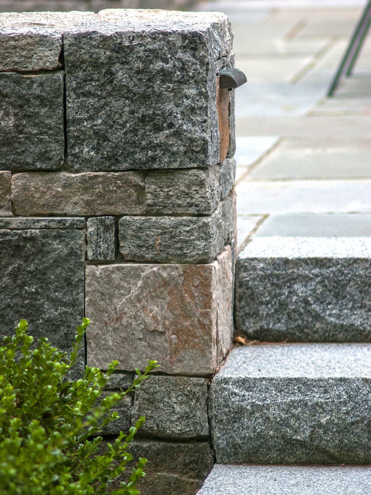 Wellesley, MA - Integrated wall lighting to illuminate the path and these granite steps.